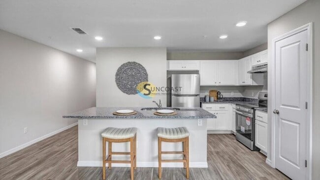 Building Photo - CHECK ME OUT! NEW BUILDS GREAT LOCATION!