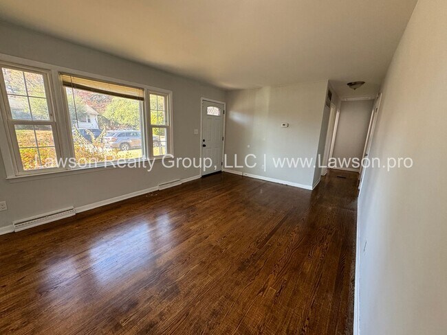 Building Photo - Solid Brick Ranch with Fenced in Yard