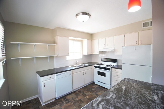 Building Photo - 5011-5015 Poppleton Ave