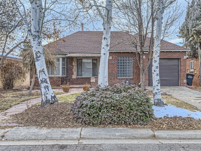 Photo - Evolve Real Estate: Available 8/8/26 Brick Tudor with Large Yard and Finished Basement! House