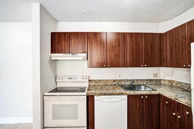 Building Photo - Updated 2 Bed, 2 Bath 1st Floor Condo with...