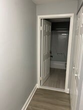 hallway into bathroom - Iron Hill Apartments