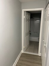 hallway into bathroom - Iron Hill Apartments
