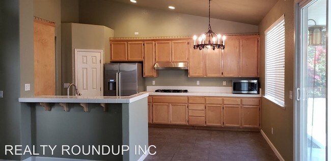 Building Photo - 4 br, 2.5 bath House - 9407 Mainline Dr