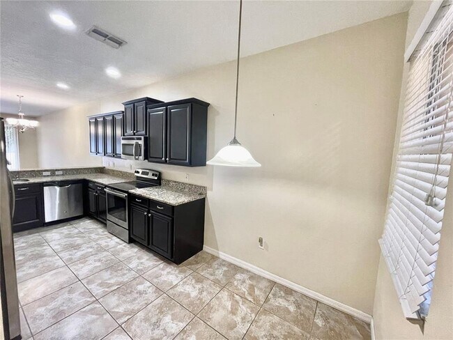 Foto del edificio - 9481 Trumpet Vine Loop