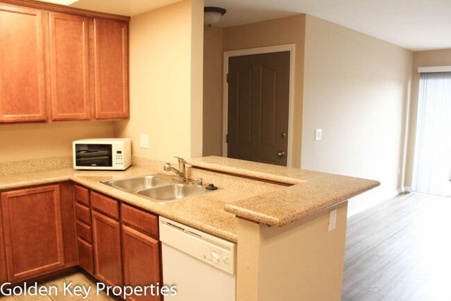 Foto del edificio - Cozy ground-level unit in the gated commun...