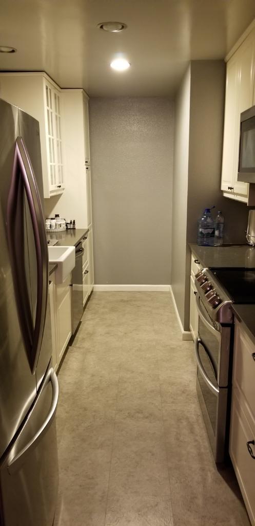 Kitchen - stove & refrigerator on right - Refrigerator on left, - 8400 De Longpre Ave
