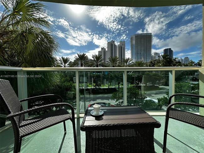 Building Photo - 19370 Collins Ave
