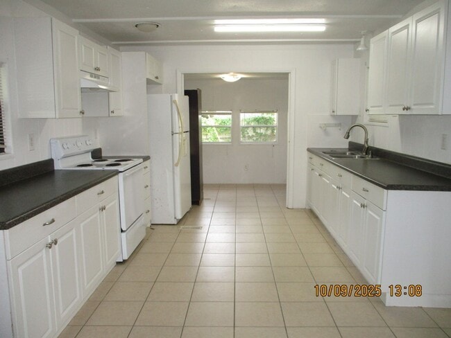 Photo - Welcome to this inviting 2-bedroom, 1-bath... House
