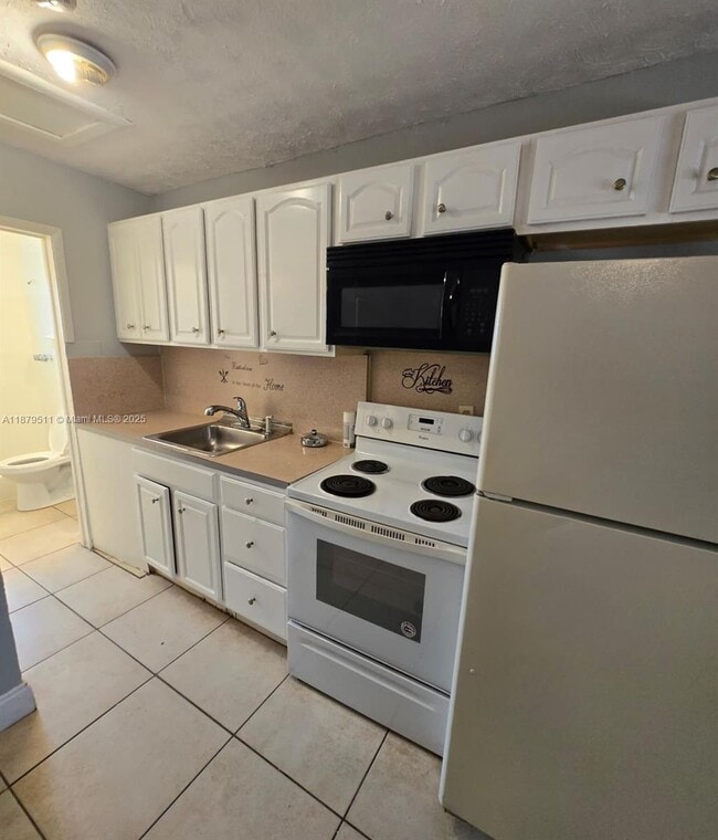 Building Photo - 3981 SW 12th Pl