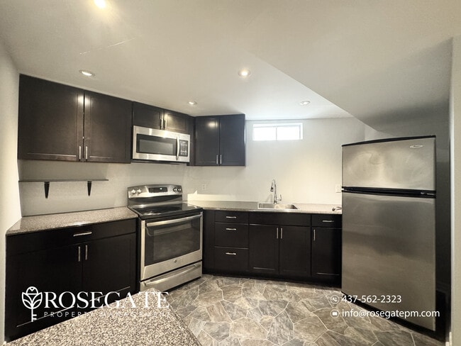 Building Photo - Bright 2-Bedroom Basement Apartment with P...
