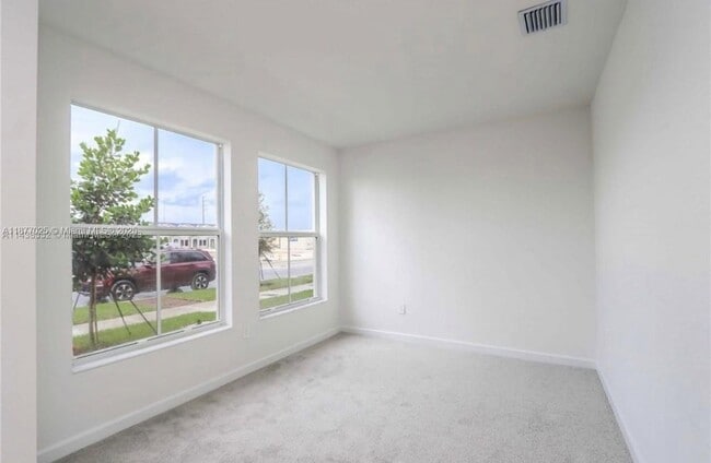 Building Photo - 26459 SW 148th Ave