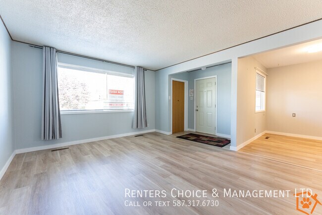 Building Photo - Half Duplex with Must-See Garage & Large Yard!