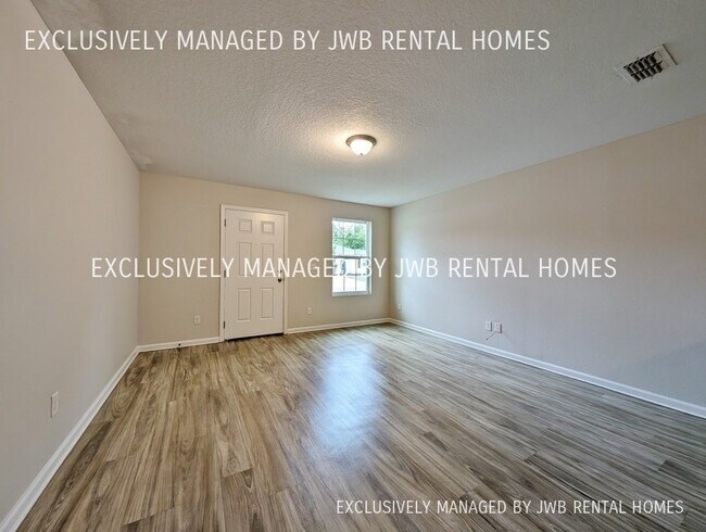 Building Photo - 8509 McGirts Village Ln