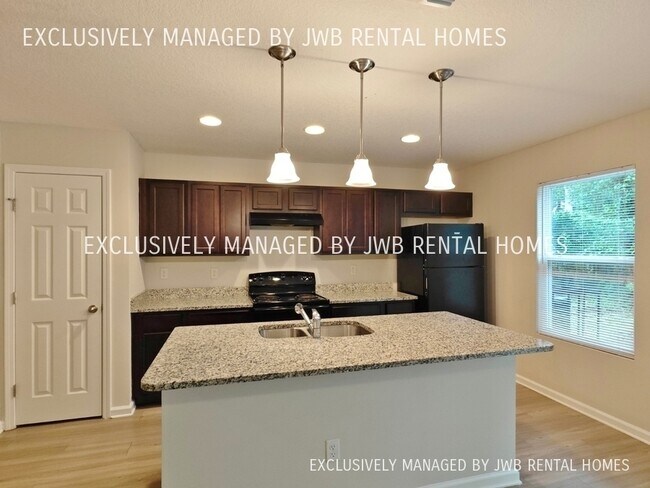 Building Photo - 8740 Buttercup St