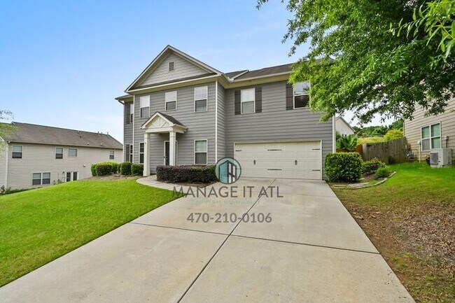 Building Photo - Spacious 4BR/2.5BA Home in Desirable Liber...