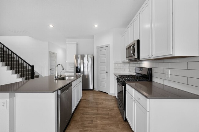 Building Photo - Like-New 4-Bedroom Corner Lot Home with Game Room, Appliances Included & Private Backyard