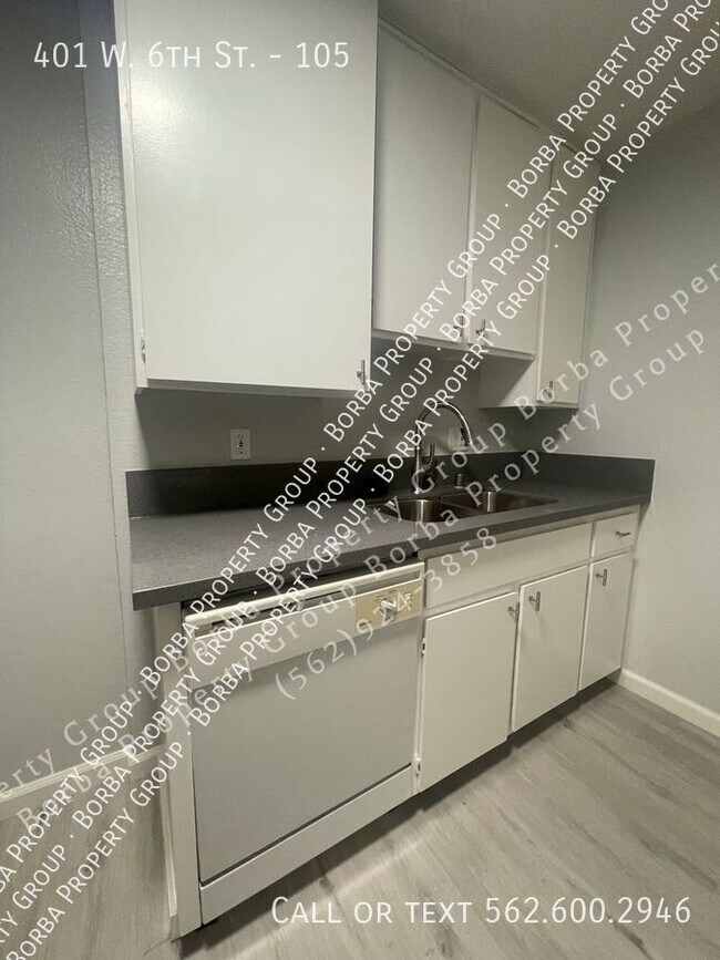 Foto del edificio - 401 W 6th St
