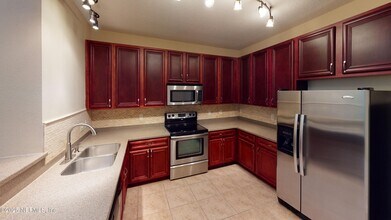 Building Photo - 8241 Pelican Landing Rd