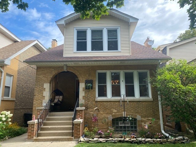 Building Photo - 6033 N Menard Ave