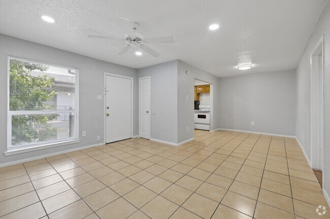 2BR, 1BA - 875SF - Living Room - Long Point Plaza