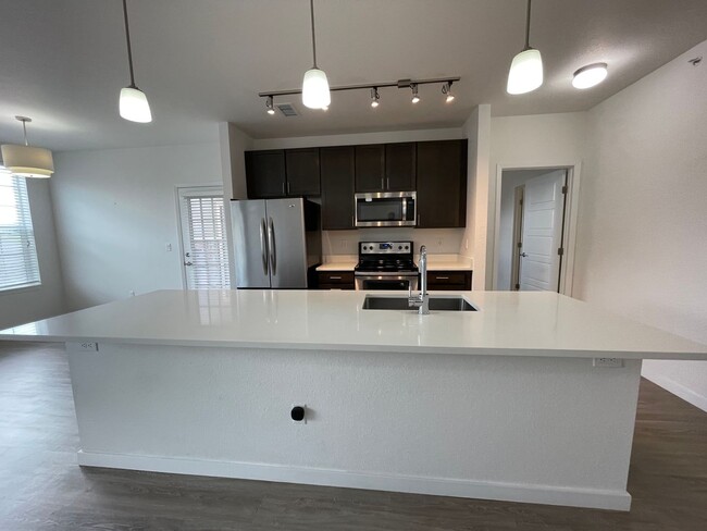 Building Photo - Brand NEW CONDO nestled right near E-470 a...