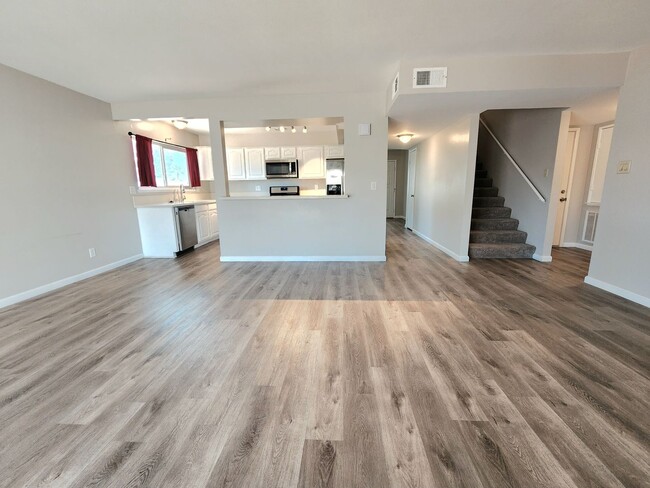 Building Photo - 4 Bedroom Two-Story Home with Downstairs Primary Bedroom & Fireplace