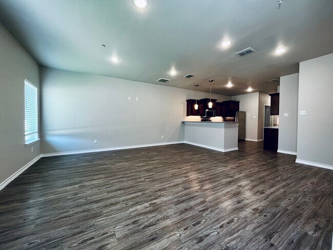 Building Photo - AUGUST MOVE-IN SPECIAL: 4 Private Suites • Walk to Texas Tech • Modern Finishes