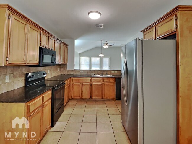 Foto del edificio - 14617 Moon Daisy Dr