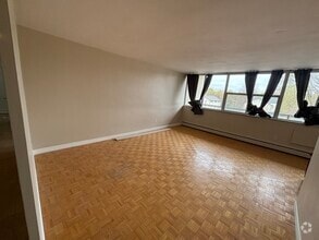Building Photo - 1061 Queen's Blvd
