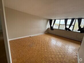 Building Photo - 1061 Queen's Blvd