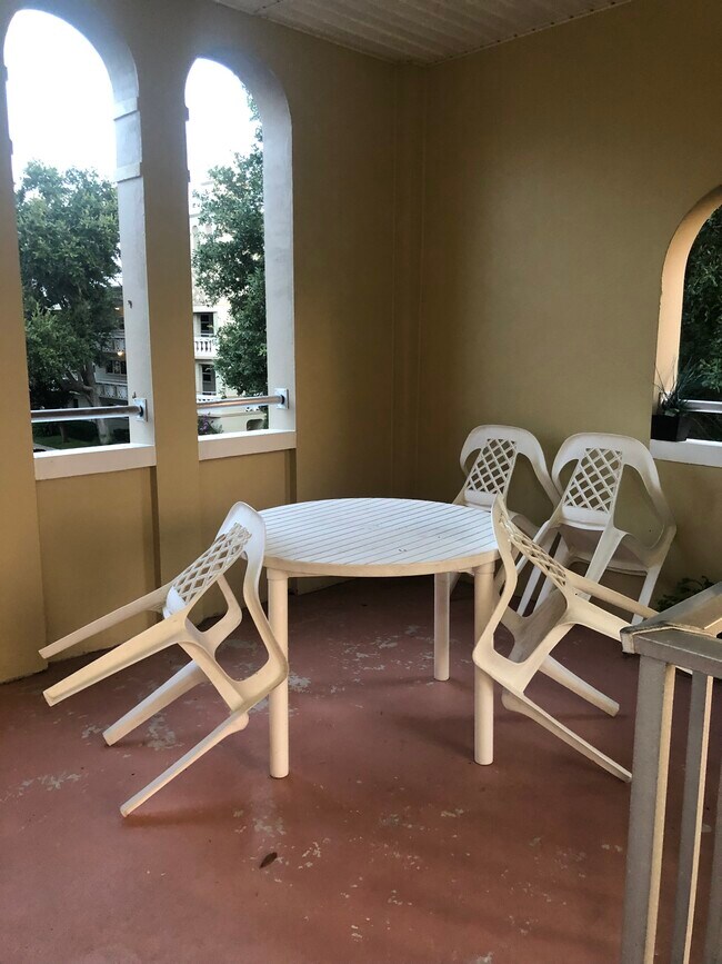 Table and chair outside unit - 2360 Irish Ln