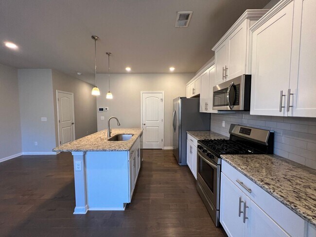 Building Photo - 3 br, 2.5 bath House - 4145 Grapevine Loop