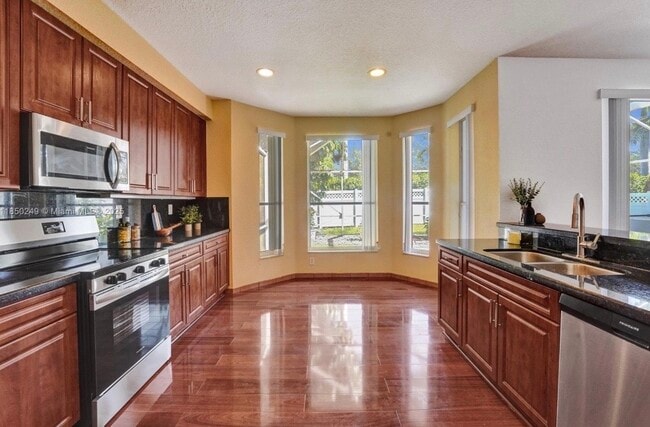 Foto del edificio - 10730 NW 56th Ct