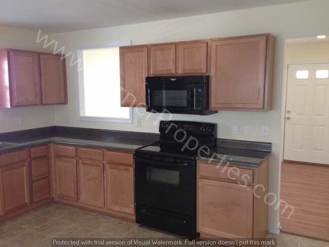 Building Photo - Neat 5 BR w/ Fenced Backyard in Lake Carolina