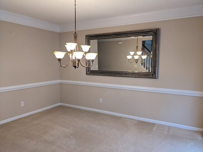 Building Photo - 4 BEDROOMS PLUS BONUS, BEAUTIFUL BACK PATI...