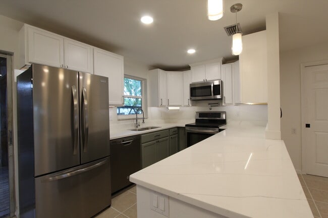 Building Photo - 6987 Duncansby Ave N