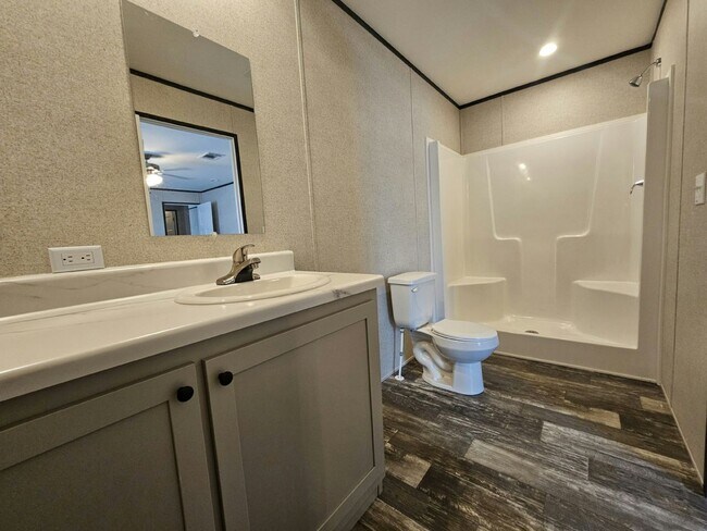 Foto del edificio - 6671 Hidden Oaks Dr