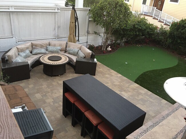 Comfortable patio furniture and gas heaters - 306 17th St