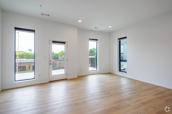 3BR, 2BA - A - 1,350SF - Living Room - Luna Apartments