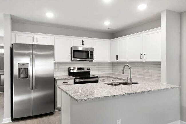 Foto del edificio - 301 Longshadow Trail - Model Townhome