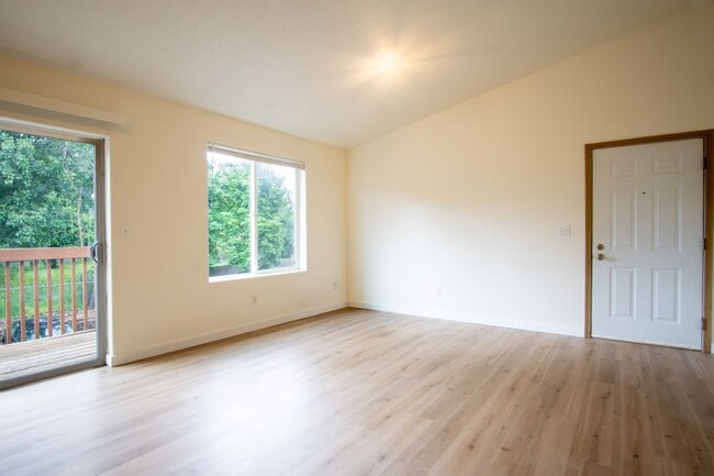 Building Photo - FREE RENT: Contemporary One Bedroom w/New Luxury Vinyl Flooring + Vaulted Ceilings!