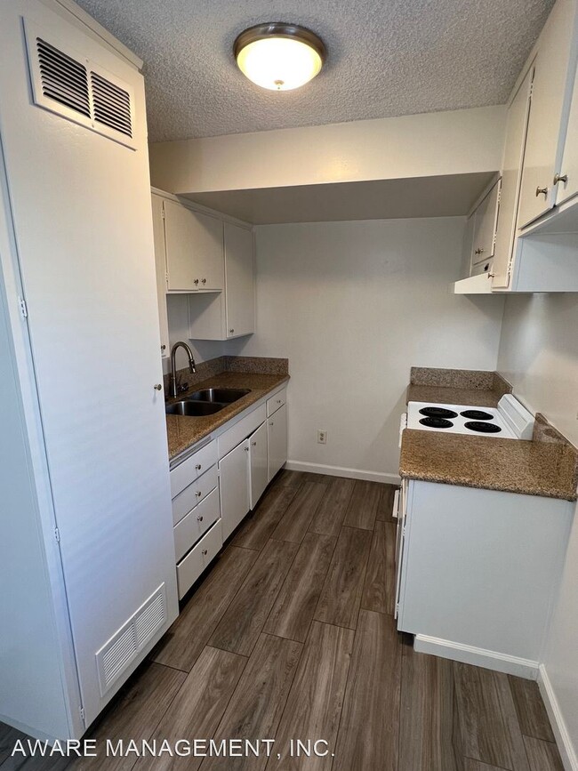 Building Photo - 3 br, 1.5 bath House - 4540 VANDEVER AVE #10