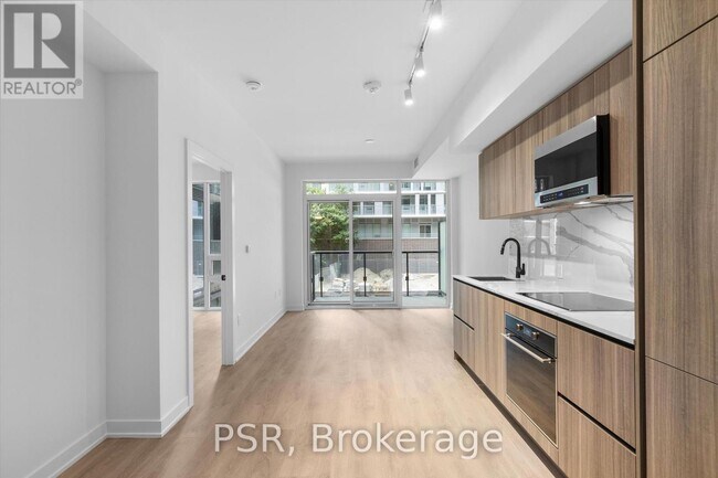 Photo du bâtiment - 117-117 Broadway Ave