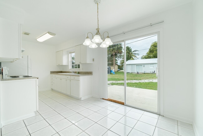 View Dining toward Kitchen - 915 SE Lake St