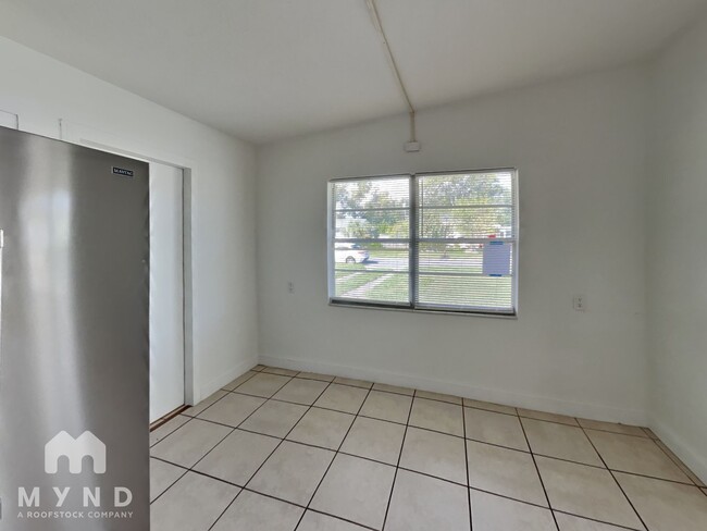 Building Photo - 7563 Meadowlawn Dr N