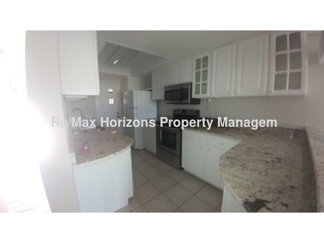 Foto del edificio - 9992 Fairway Villas Ln
