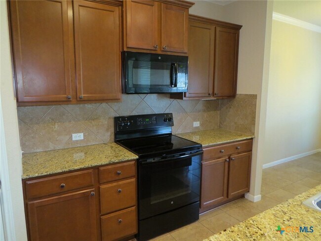 Foto del edificio - 5623 Blackstone Dr