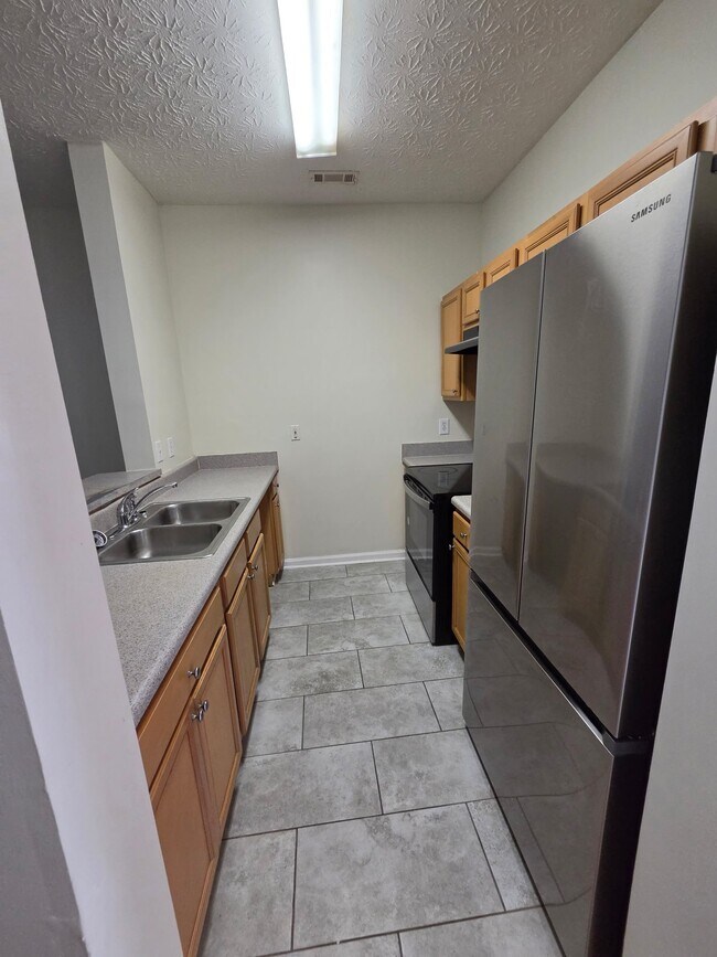 Building Photo - 6076 Camden Forrest Dr
