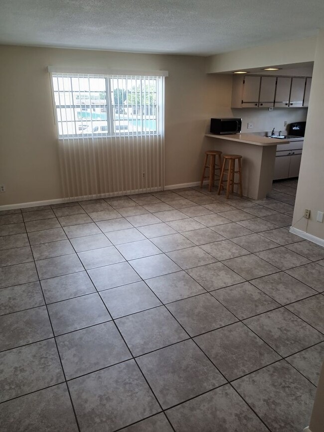 Photo - 1 Bedroom Condo with Community Pool and La...